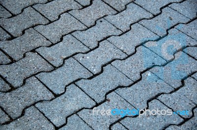 Bone Shaped Cobblestone Tiles Stock Photo