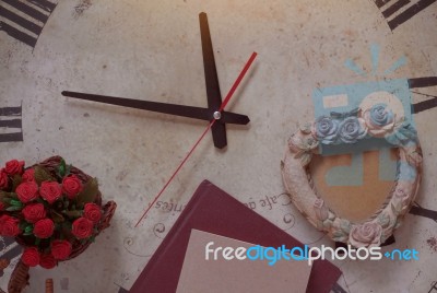 Book And Frame On Clock Stock Photo