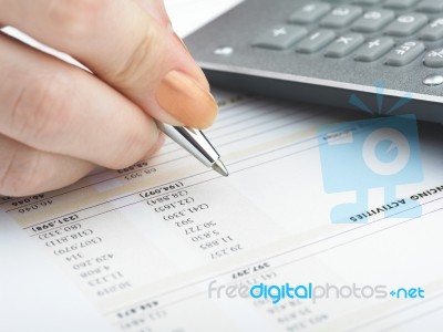 Bookkeeping With Calculator Stock Photo