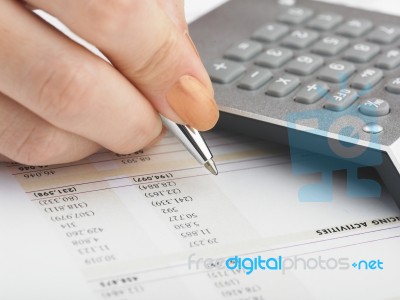 Bookkeeping With Calculator Stock Photo