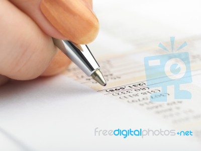 Bookkeeping With Pen Stock Photo