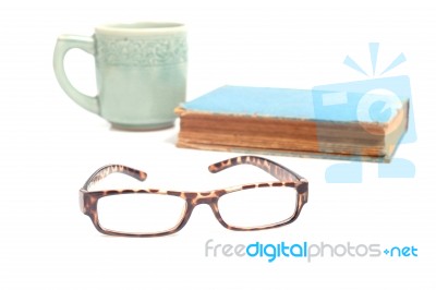 Books, Glasses And Coffee Cup Stock Photo