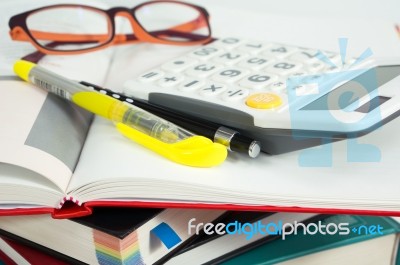 Books With Marker Pen And Calculator Stock Photo