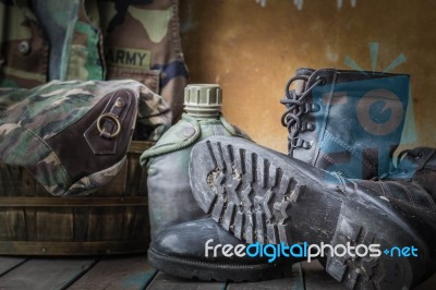 Boots Of Soldiers On Wooden Stock Photo