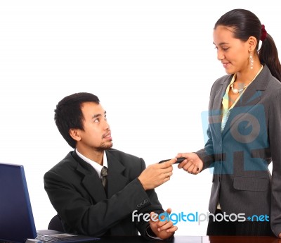 Boss Giving Cell To His Worker Stock Photo