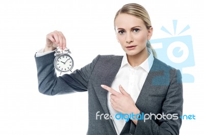 Boss Pointing At Alarm Clock, You Are Late! Stock Photo