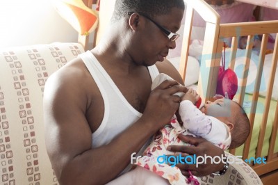 Bottle Feeding Stock Photo