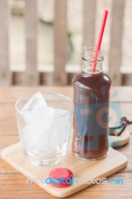 Bottle Of Black Coffee With Ice Stock Photo