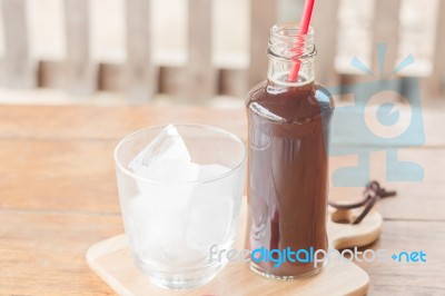 Bottle Of Black Coffee With Ice Stock Photo