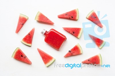 Bottle Of Fresh Watermelon Juice With  Watermelon Pieces Stock Photo