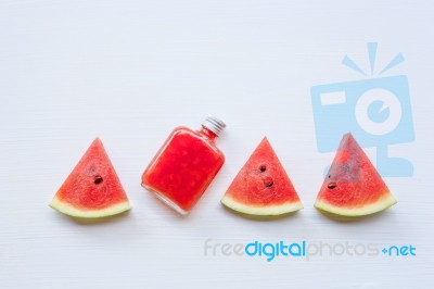 Bottle Of Fresh Watermelon Juice With  Watermelon Pieces Stock Photo