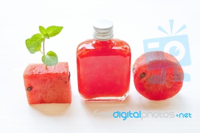 Bottle Of Fresh Watermelon Juice With  Watermelon Pieces Stock Photo