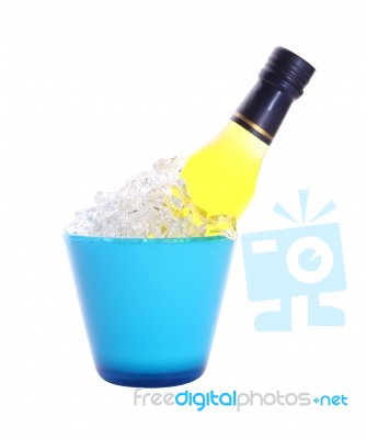 Bottle Of Liquor In Blue Ice Bucket On White Background Stock Photo