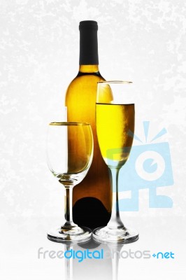 Bottles And Glasses Of Wine Stock Photo