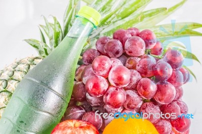 Bottles Of Fruit Juice And Fruits Stock Photo