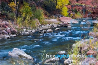 Boulders In The Virgin River Stock Photo