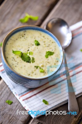 Bowl Of Broccoli And Cheddar Cheese Soup Stock Photo