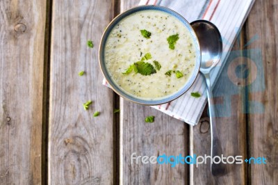 Bowl Of Broccoli And Cheddar Cheese Soup Stock Photo