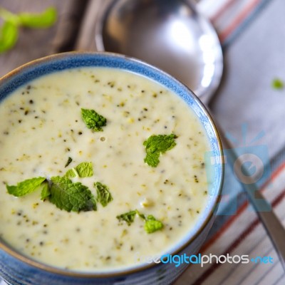 Bowl Of Broccoli And Cheddar Cheese Soup Stock Photo