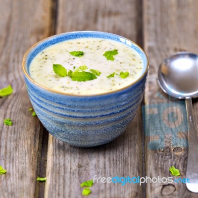 Bowl Of Broccoli And Cheddar Cheese Soup Stock Photo