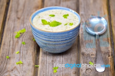 Bowl Of Broccoli And Cheddar Cheese Soup Stock Photo