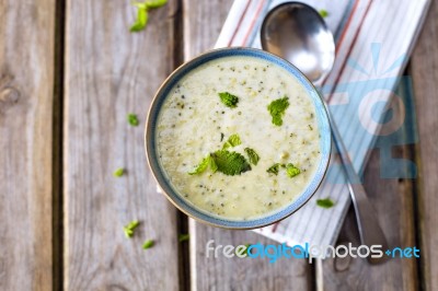 Bowl Of Broccoli And Cheddar Cheese Soup Stock Photo