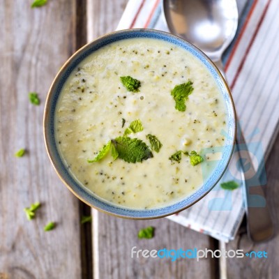 Bowl Of Broccoli And Cheddar Cheese Soup Stock Photo