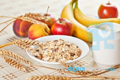 Bowl Of Muesli For Breakfast With Fruits Stock Photo