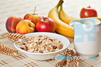 Bowl Of Muesli For Breakfast With Fruits Stock Photo