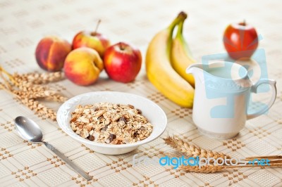 Bowl Of Muesli For Breakfast With Fruits Stock Photo