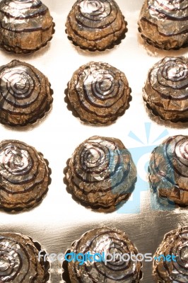 Box Of Sweet Round Chocolate Candies Stock Photo