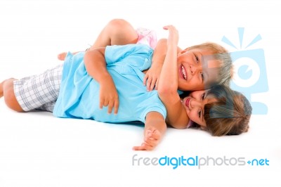 Boy And Girl Lying Down Stock Photo