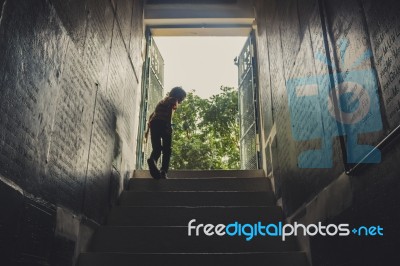 Boy Climbing Stairs Stock Photo