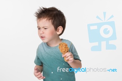 Boy Dislike Fried Chicken Stock Photo