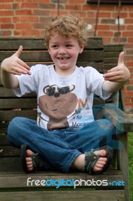 Boy Doing Cool Gesture Stock Photo