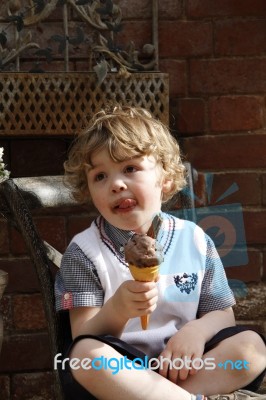 Boy Enjoying An Ice Cream Stock Photo