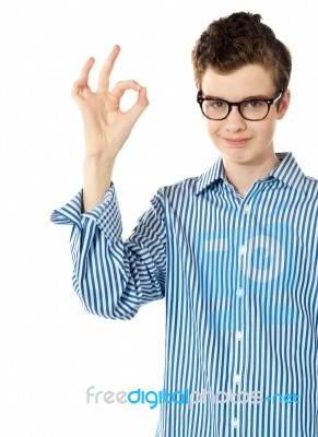 Boy Gesturing okay Sign Stock Photo