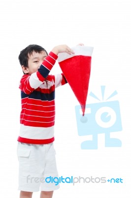 Boy Hold Santa Hat  On White Background Stock Photo