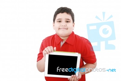 Boy Holding Tablet Computer Stock Photo