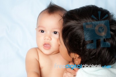 Boy Kiss His Brother Stock Photo