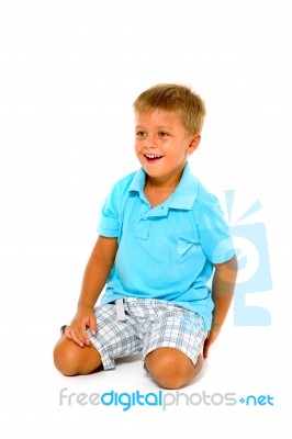 Boy Kneeling Down Stock Photo