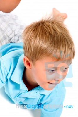 Boy Lying Down Stock Photo