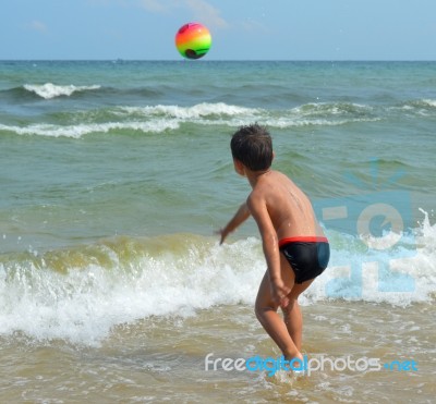 Boy On The Beach Stock Photo