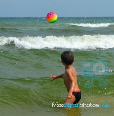 Boy On The Beach Stock Photo