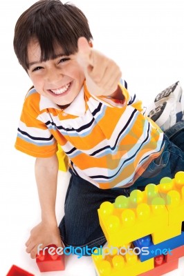 Boy Playing With Blocks Stock Photo