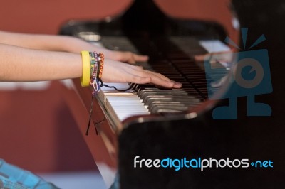 Boy Plays Piano Stock Photo