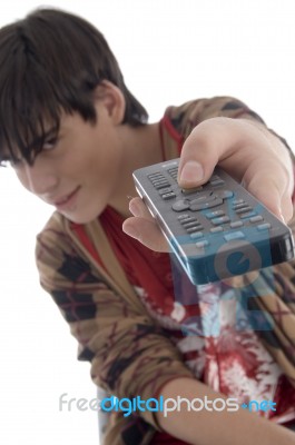 Boy Posing With Remote Stock Photo