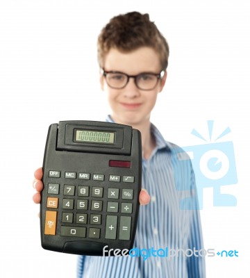 Boy Showing Calculator Stock Photo