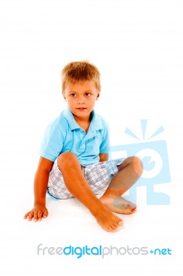 Boy Sitting Stock Photo