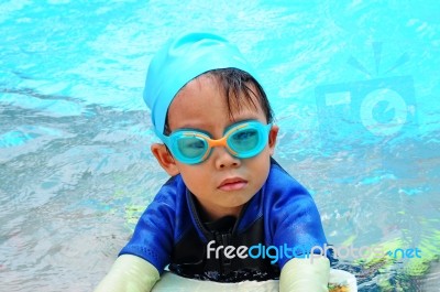 Boy With Swimming Accessories Stock Photo